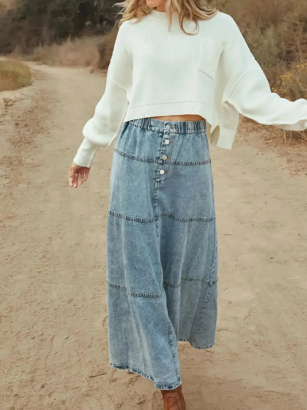 Flowy button-front tiered maxi denim skirt by Plush Fashion Hub, casual long jean skirt with a trendy tiered design.