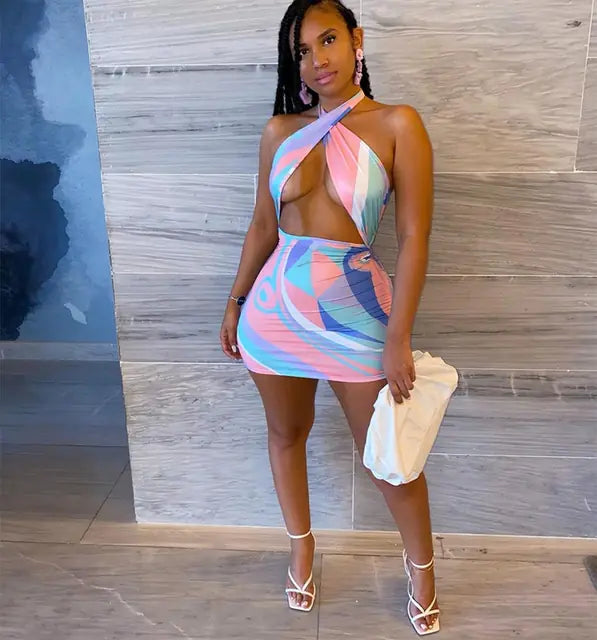 Colorful rainbow tie dye halter bodycon mini dress for women, featuring a fitted style and vibrant design.