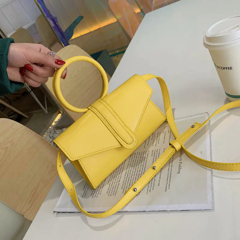 Women’s trendy shoulder tote bag and crossbody purse by Plush Fashion Hub, showing stylish design and versatile carry options.