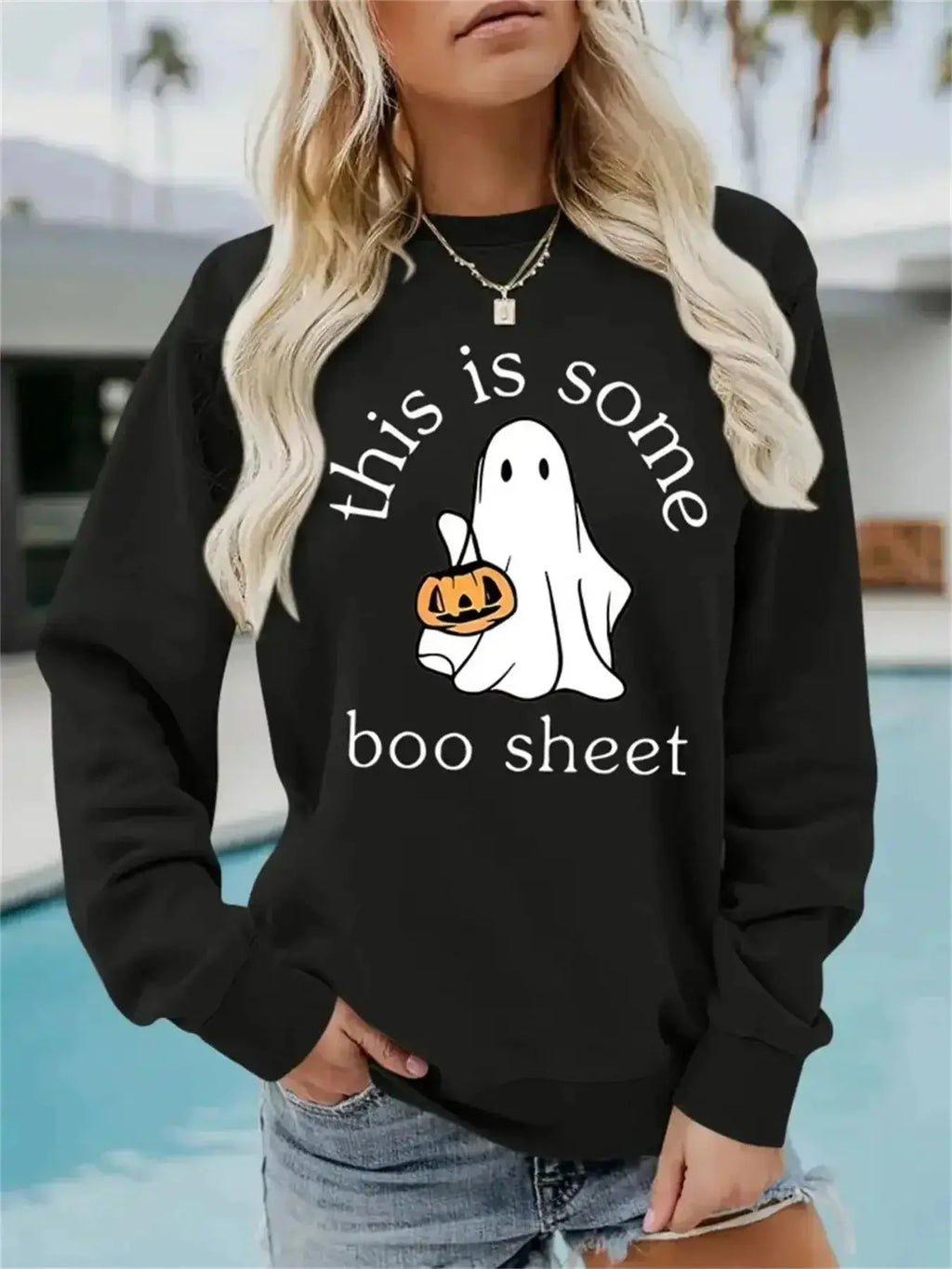 Plush Fashion Hub Boo Sheet Halloween graphic pullover hoodie with long sleeves, cozy cotton blend fleece, and round neck design.