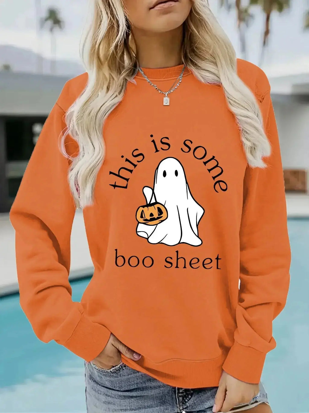 Casual black Halloween hoodie by Plush Fashion Hub with Boo sheet graphic, long sleeves, round neck, cozy cotton blend fleece.
