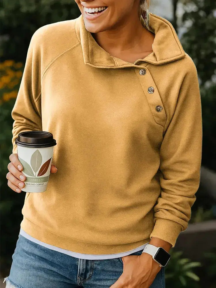 Women's casual slant collar button pullover sweatshirt in solid color with long sleeves, relaxed fit, from Plush Fashion Hub.