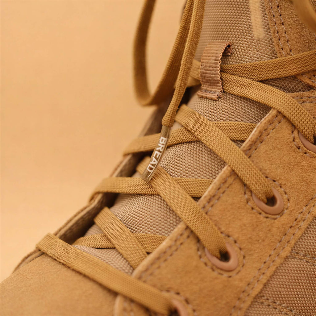 Coyote brown elastic shoelace by Bread, showing close-up of flexible, durable laces designed for comfortable shoe fit.