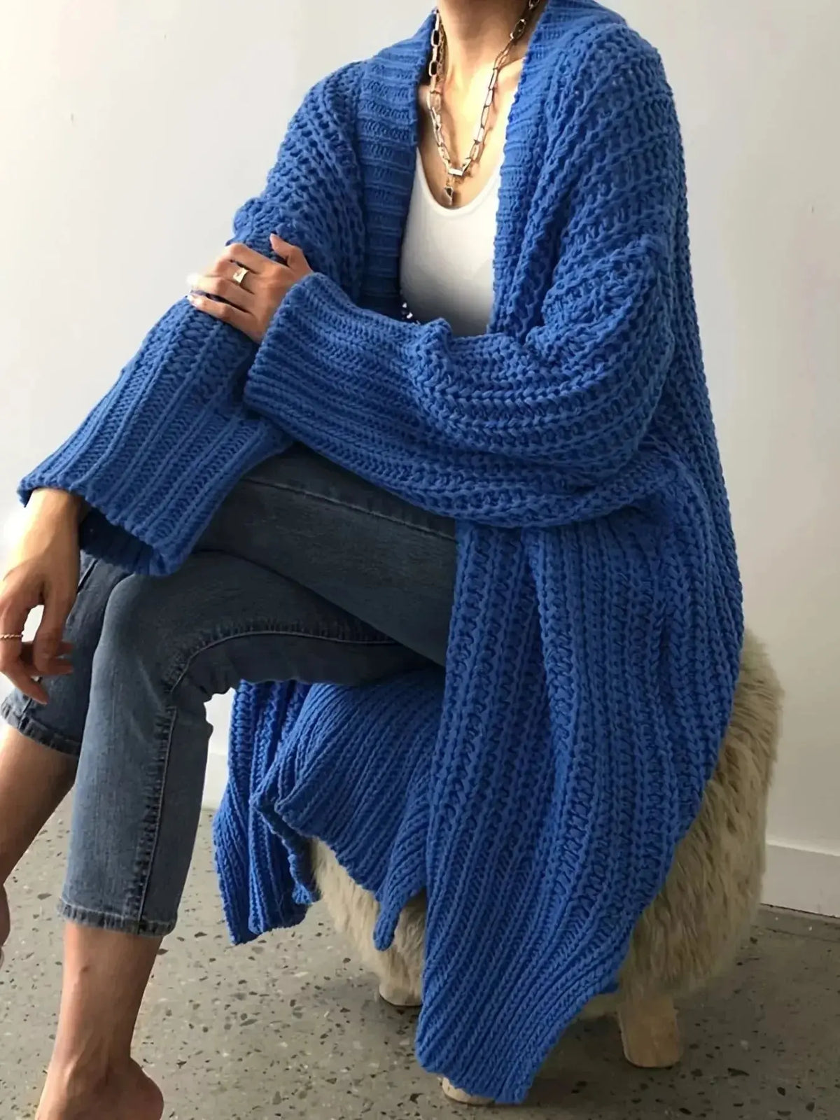 Women's chunky knit open-front cardigan with long sleeves from Plush Fashion Hub, cozy and stylish for casual wear.
