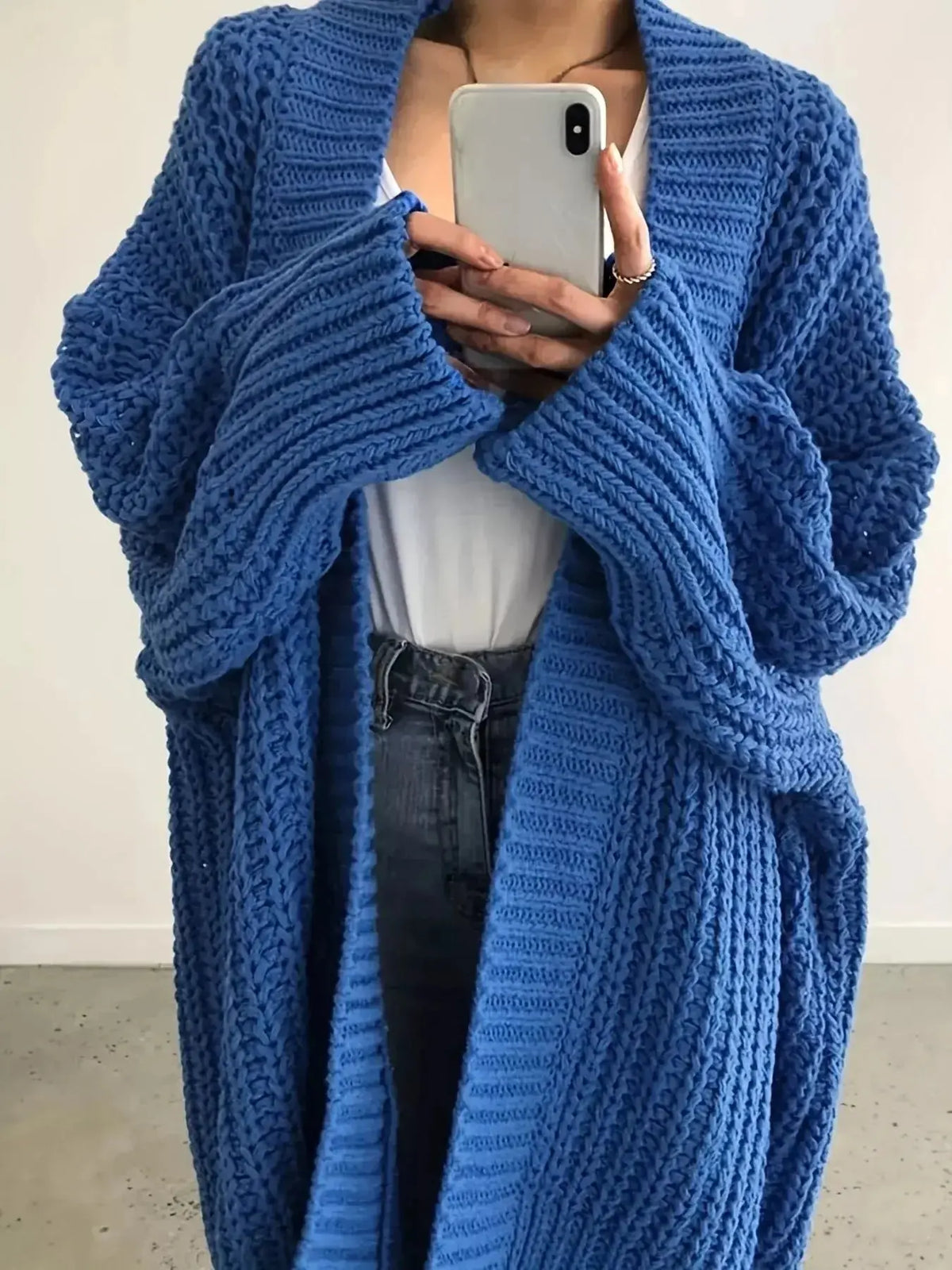 Women's chunky knit open-front cardigan sweater with long sleeves by Plush Fashion Hub, soft and cozy for layered style.