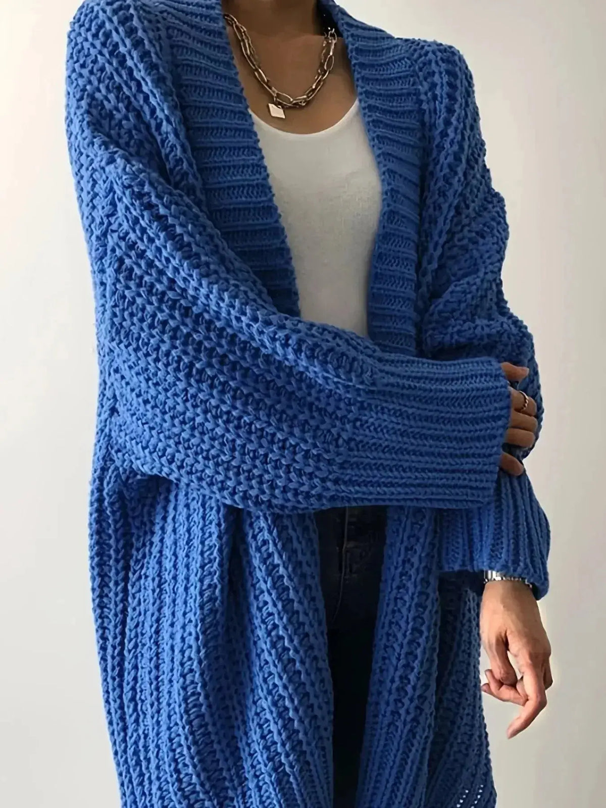 Women's chunky knit open-front cardigan with long sleeves from Plush Fashion Hub, cozy and stylish sweater for casual wear.