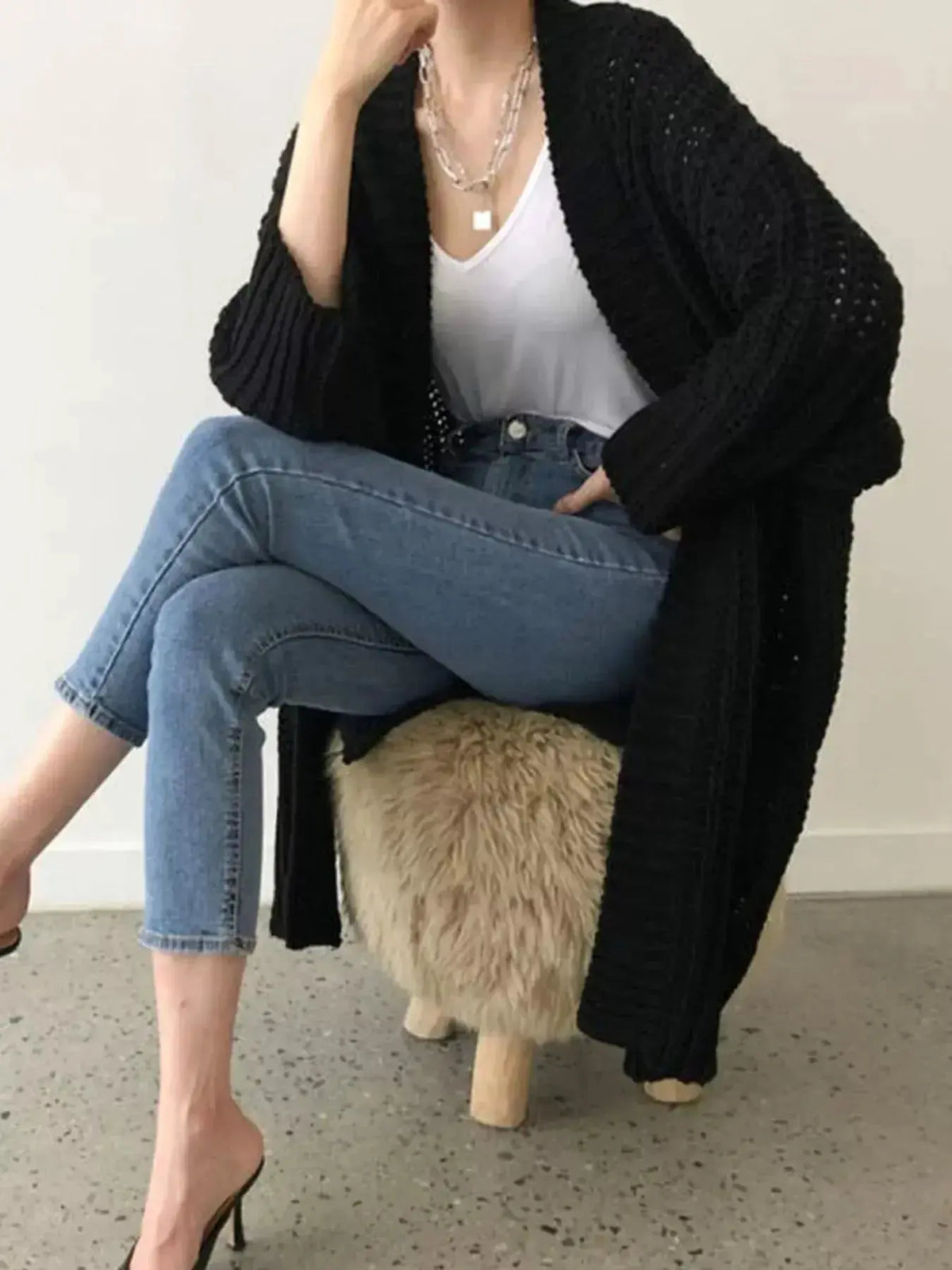 Women's chunky knit open-front cardigan with long sleeves, soft and cozy sweater by Plush Fashion Hub.