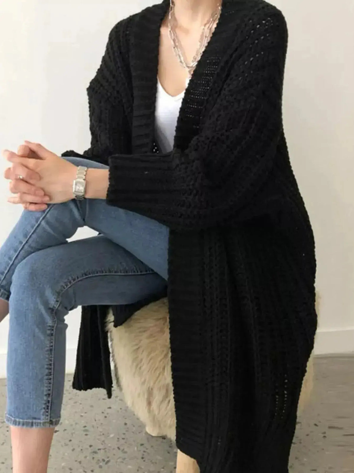 Women’s chunky knit open-front cardigan with long sleeves, plush fashion hub sweater in soft, cozy material.