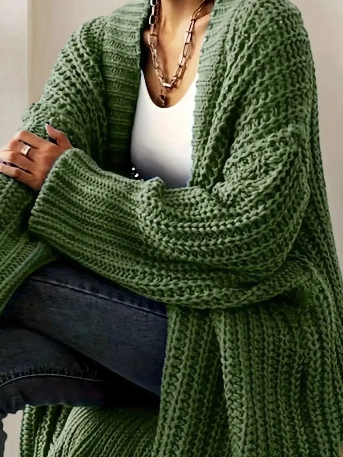 Women’s chunky knit open-front cardigan with long sleeves by Plush Fashion Hub, soft and cozy sweater for casual wear.