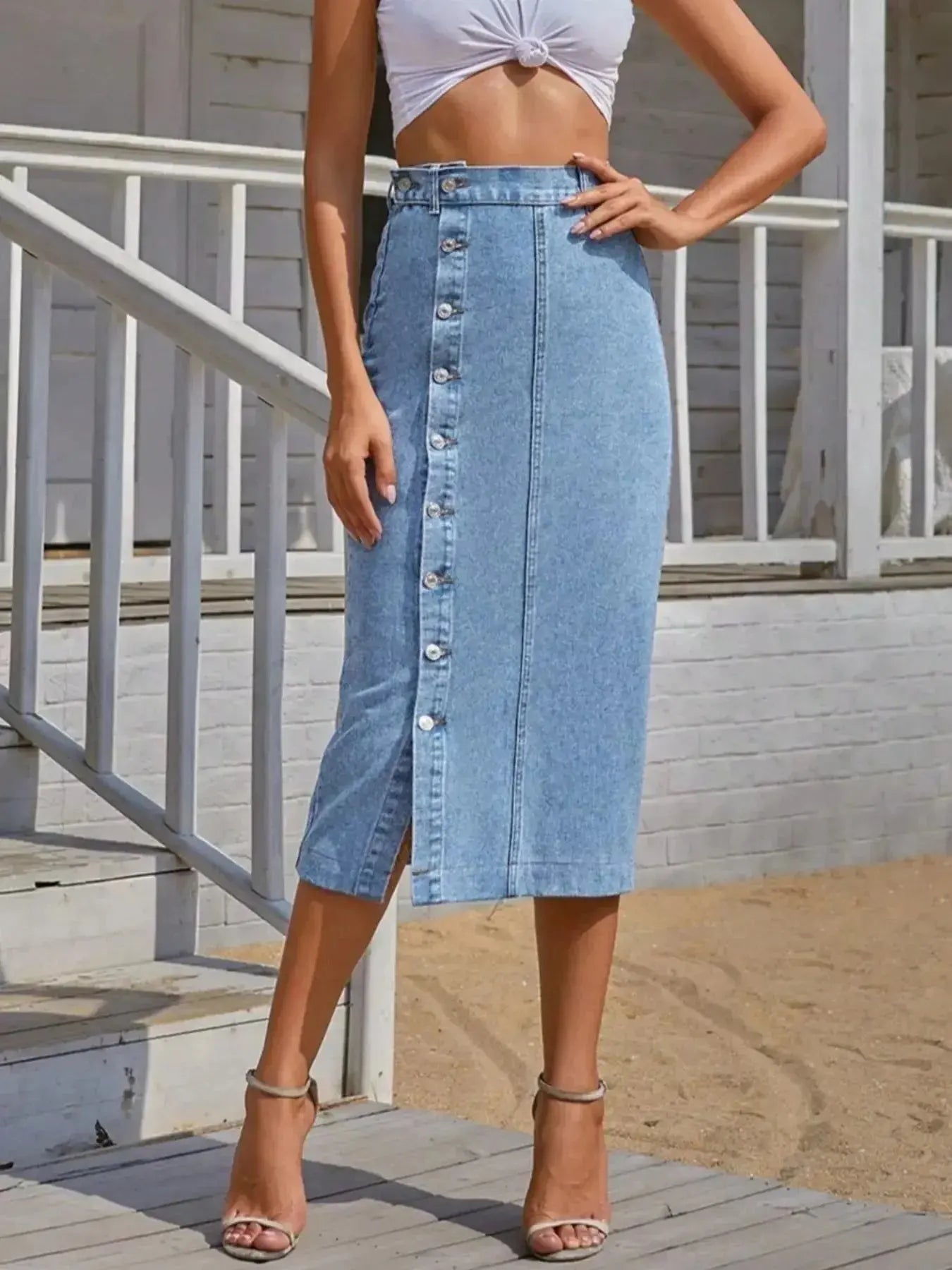 Stretch denim skirt for women with button-front closure, stylish and casual by Trendsi, showcasing the classic denim design.