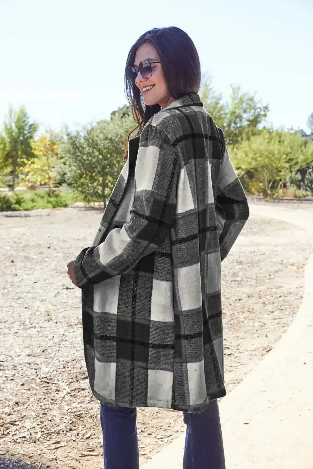 Women’s plaid button-up lapel coat by Plush Fashion Hub, seasonal wool-feel outerwear with classic plaid design and tailored fit.