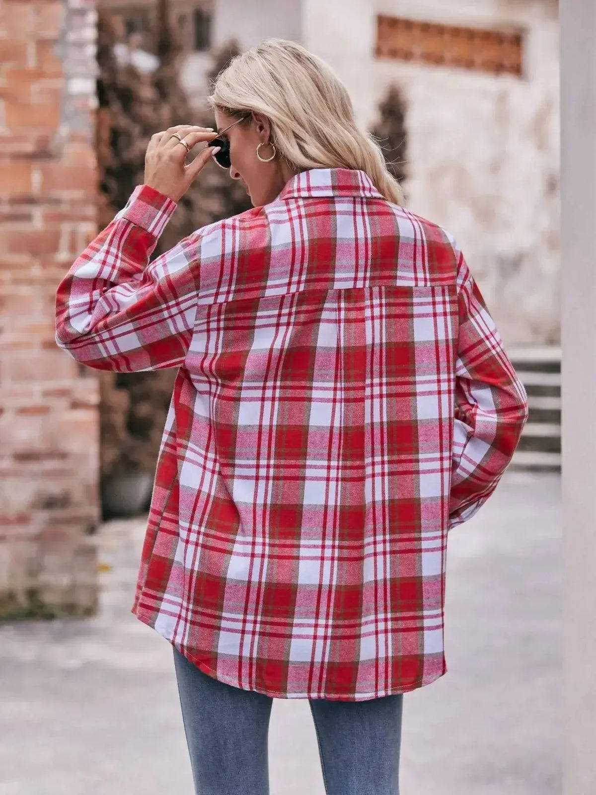 Plaid long sleeve button-down shirt for women by Plush Fashion Hub, featuring a classic plaid pattern and tailored fit.