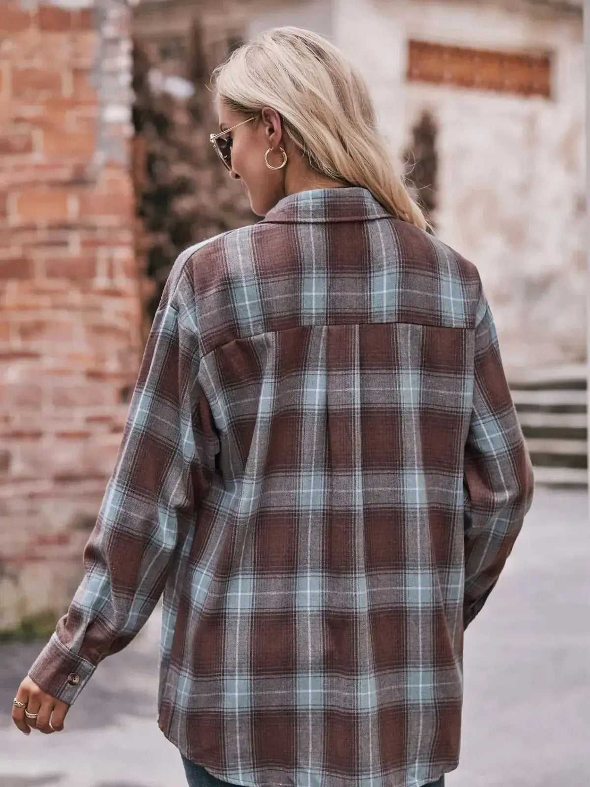 Women’s classic plaid long sleeve button-down shirt by Plush Fashion Hub, featuring a timeless pattern and tailored fit.