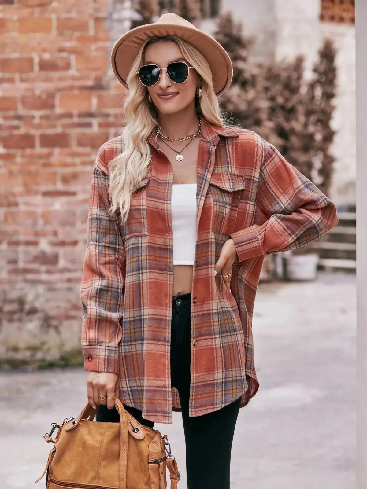 Women’s classic plaid long sleeve button-down shirt by Plush Fashion Hub, featuring a stylish pattern and tailored fit.