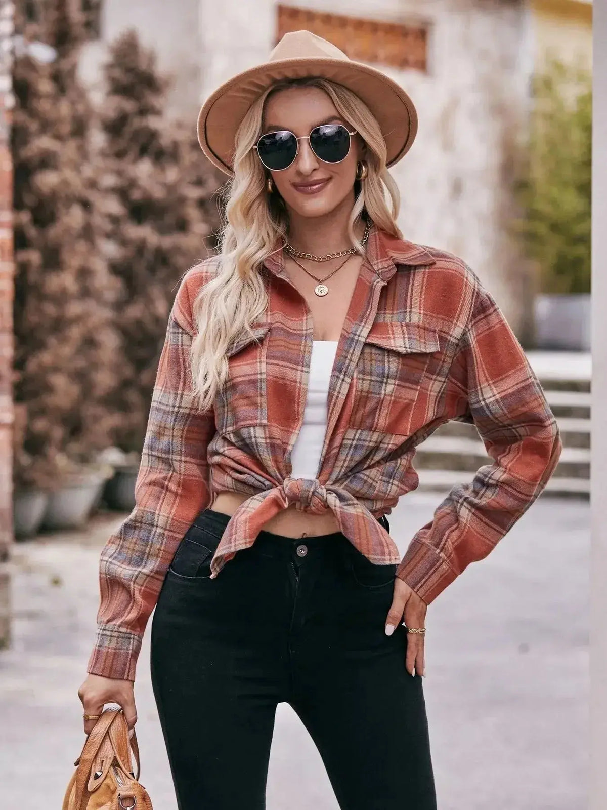 Women’s classic plaid long sleeve button-down shirt by Plush Fashion Hub, featuring a stylish, timeless design and comfortable fit.