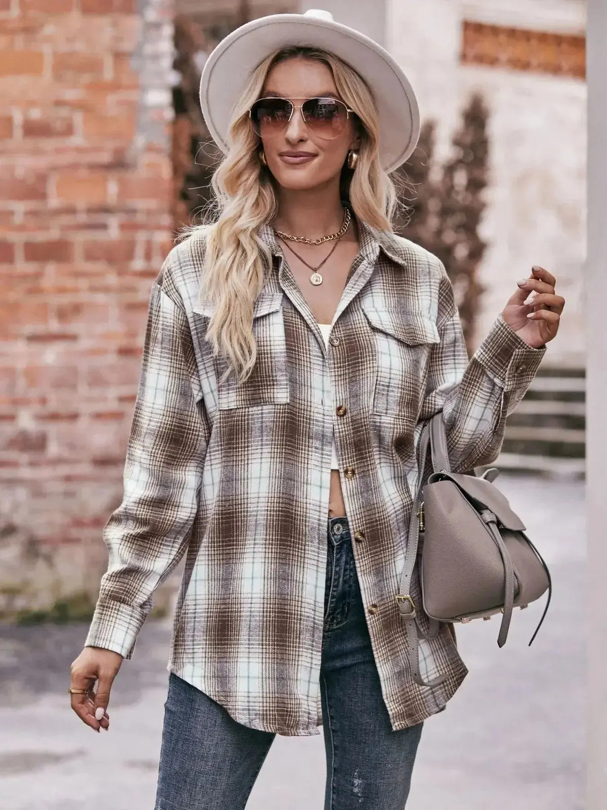 Plaid long sleeve button-down shirt for women by Plush Fashion Hub, featuring a classic pattern and casual fit.