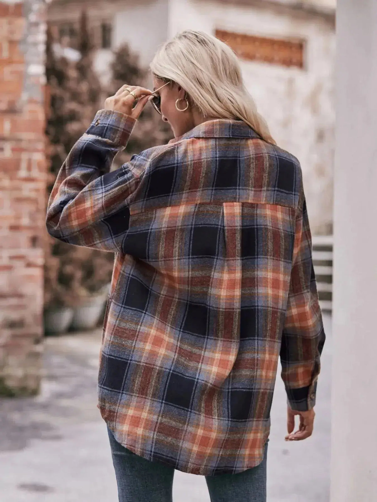 Plaid long sleeve button-down shirt for women by Plush Fashion Hub, featuring a classic plaid pattern and casual fit.