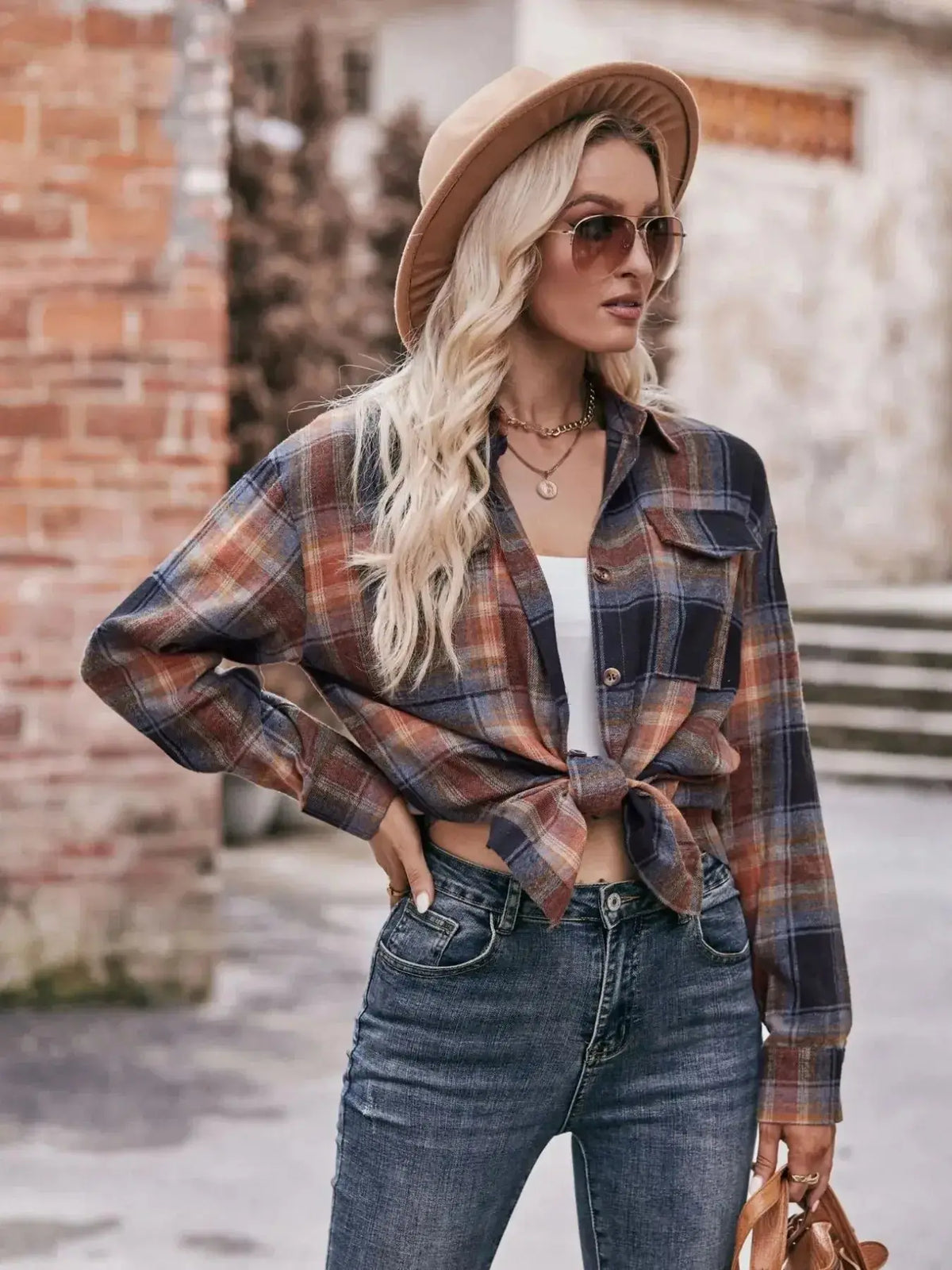 Women’s classic plaid long sleeve button-down shirt by Plush Fashion Hub, featuring a timeless pattern and casual fit.