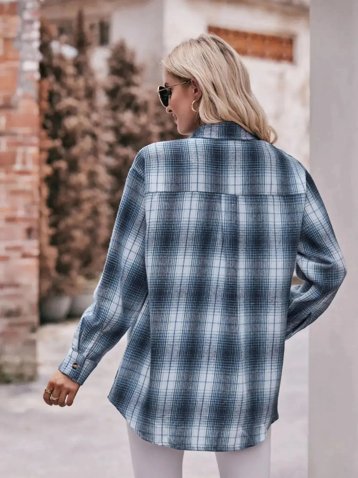 Women’s classic plaid long sleeve button-down shirt by Plush Fashion Hub, featuring a stylish and timeless design.