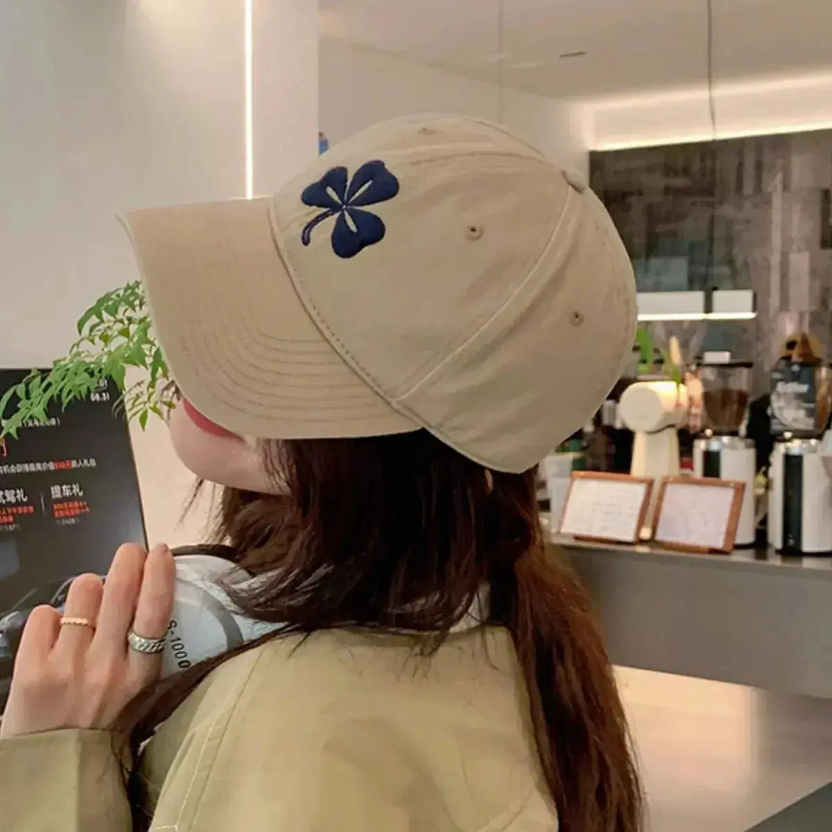 Clover embroidered 100% cotton baseball cap by Plush Fashion Hub, breathable casual hat with adjustable strap and classic design.