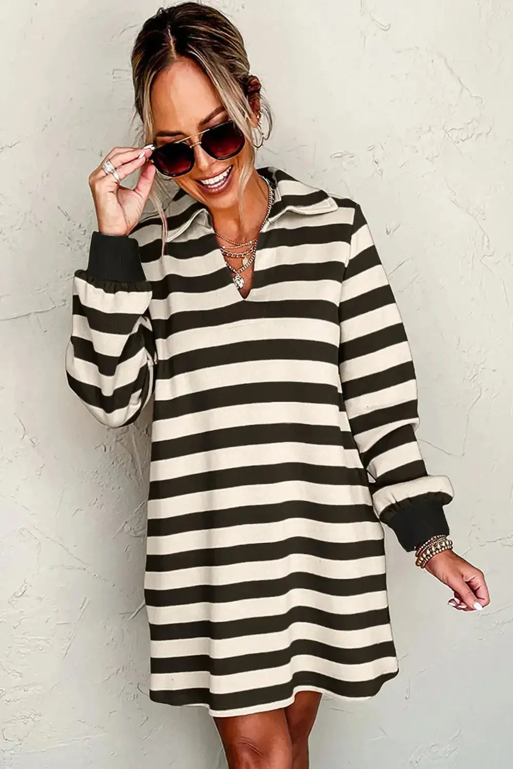 Contrast striped long sleeve mini dress with Johnny collar by Plush Fashion Hub, featuring bold vertical and horizontal stripe patterns.