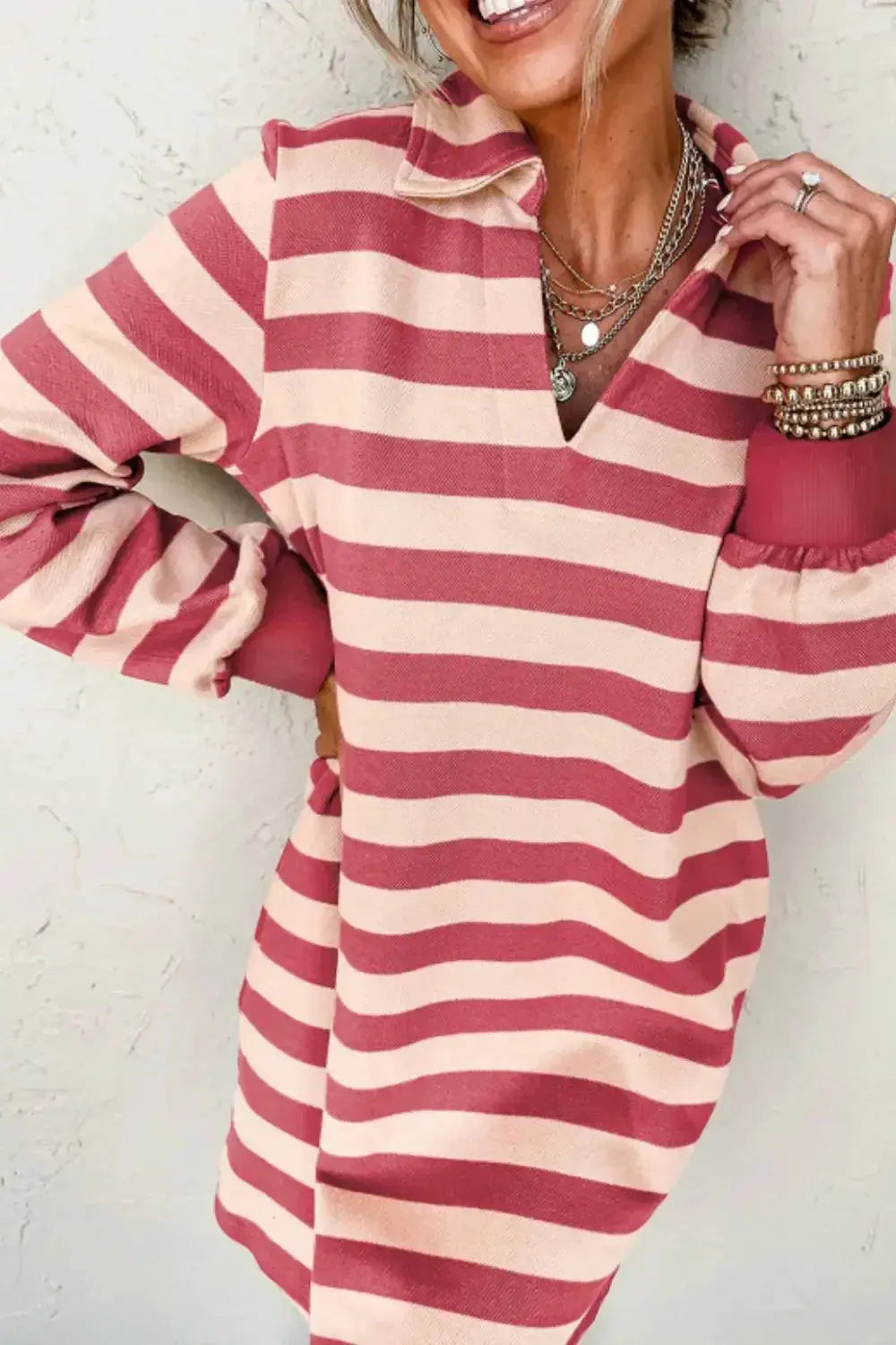 Contrast striped long sleeve mini dress with Johnny collar by Plush Fashion Hub, featuring bold vertical stripes and a stylish collar.