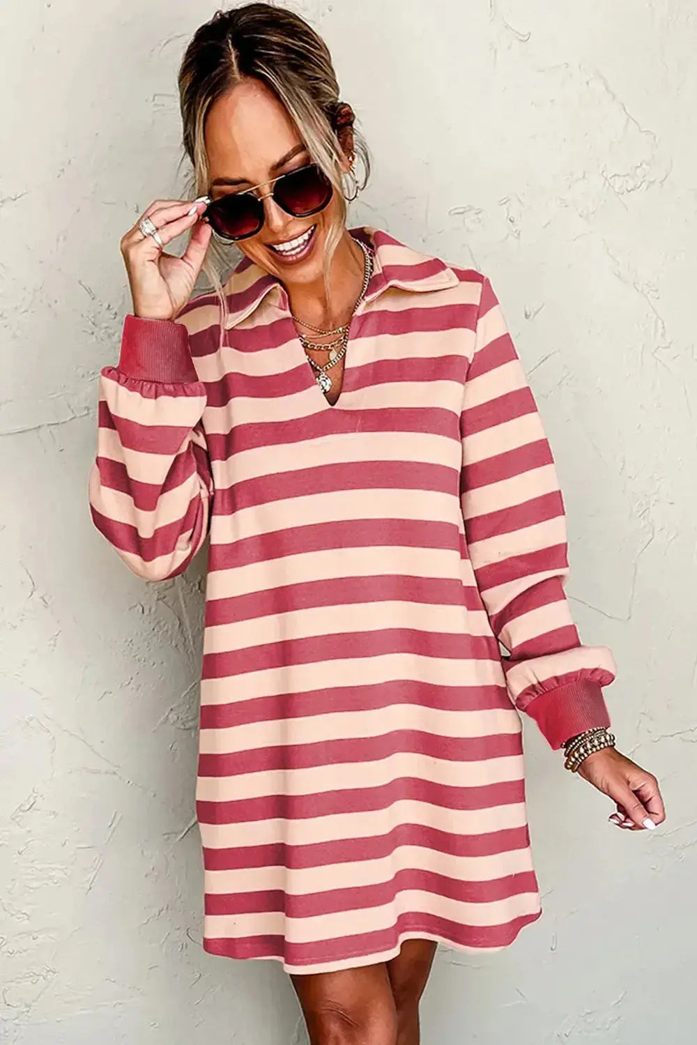 Contrast striped long sleeve mini dress with Johnny collar by Plush Fashion Hub, featuring bold vertical and horizontal stripe patterns.