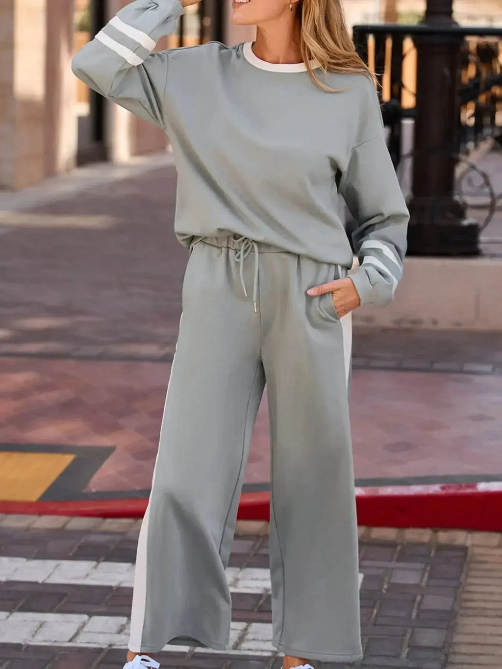 Contrast trim lounge pants from Trendsi, cozy two-piece round neck set, featuring comfortable casual fit and stylish design.
