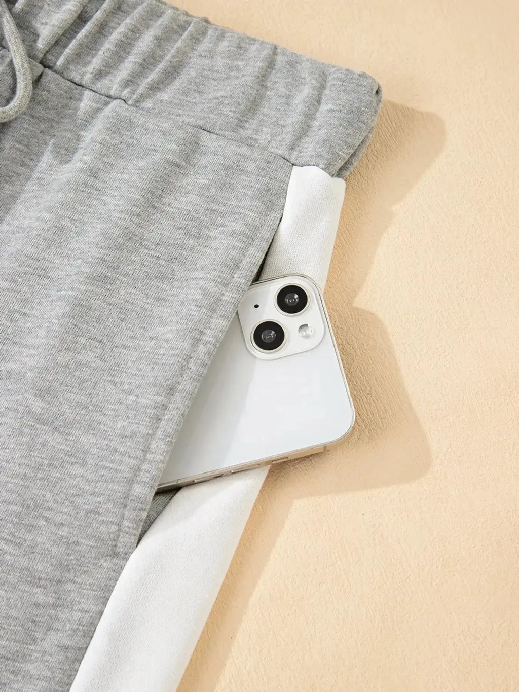 Contrast trim lounge pants from Trendsi, featuring a cozy round neck design and comfortable two-piece set for relaxed wear.