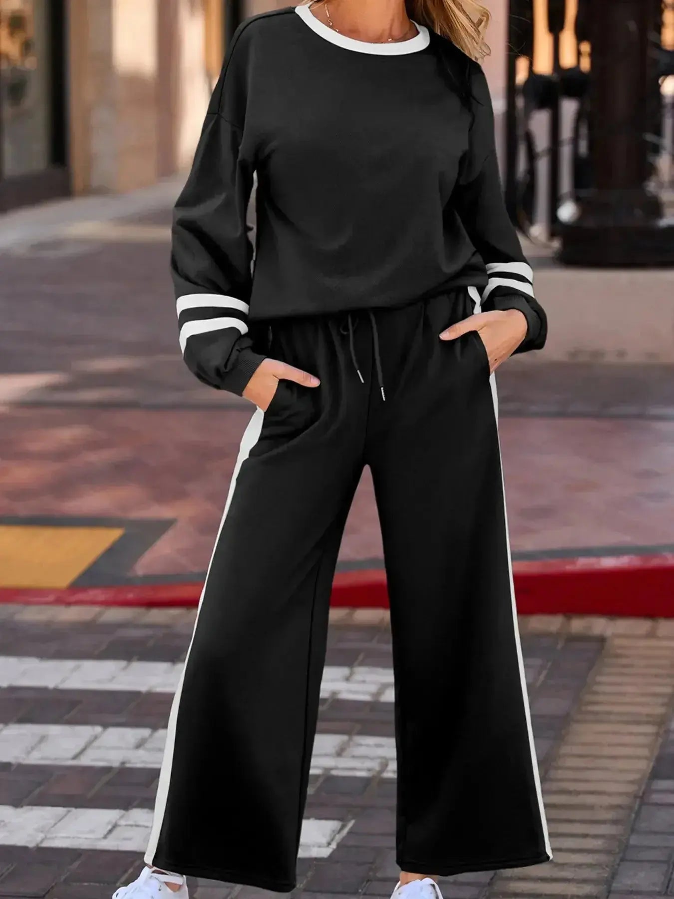 Trendsi contrast trim round neck lounge set featuring cozy two-piece top and pants, casual comfortable loungewear for relaxed wear.