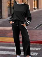 Contrast trim round neck lounge pants from Trendsi, cozy two-piece set with matching top and comfortable fit.