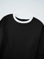 Contrast trim round neck lounge pants from Trendsi, cozy two-piece set with matching top and comfortable fit.