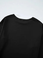 Trendsi contrast trim round neck lounge set featuring cozy two-piece matching top and pants, ideal for comfortable loungewear.