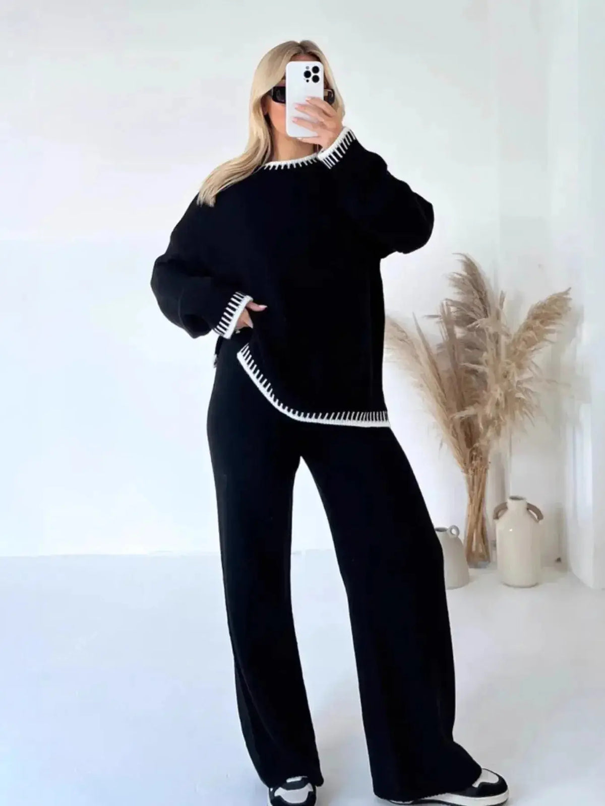Plush Fashion Hub lounge set with contrast trim round neck sweater top and wide-leg pants, casual and comfortable outfit.