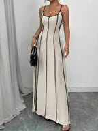 Flowy summer evening maxi dress with contrast trim, spaghetti straps, and ruched details by Trendsi, perfect for warm-weather occasions.