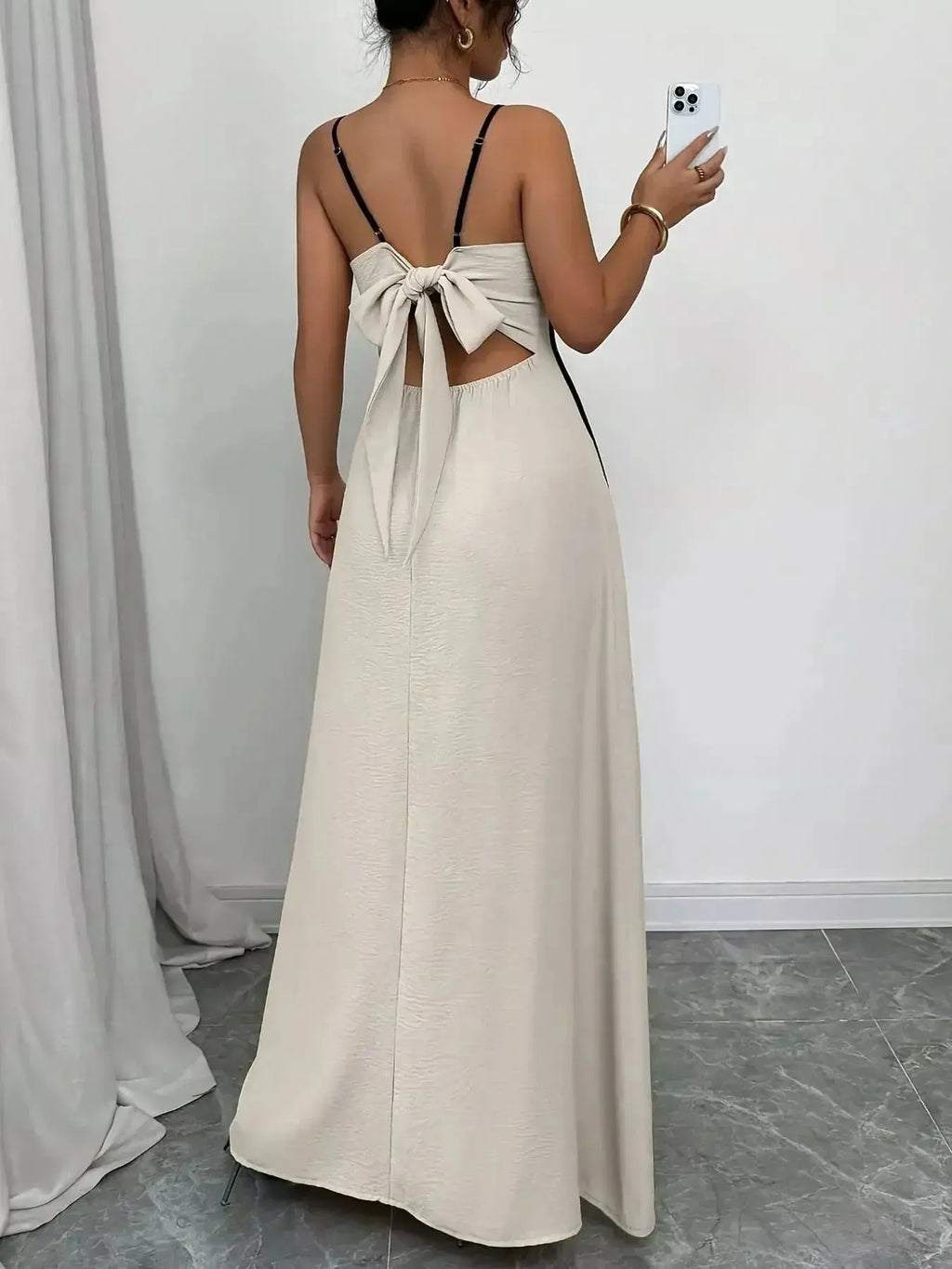 Flowy summer maxi dress with contrast trim, spaghetti straps, and ruched bodice, perfect for evening wear by Trendsi