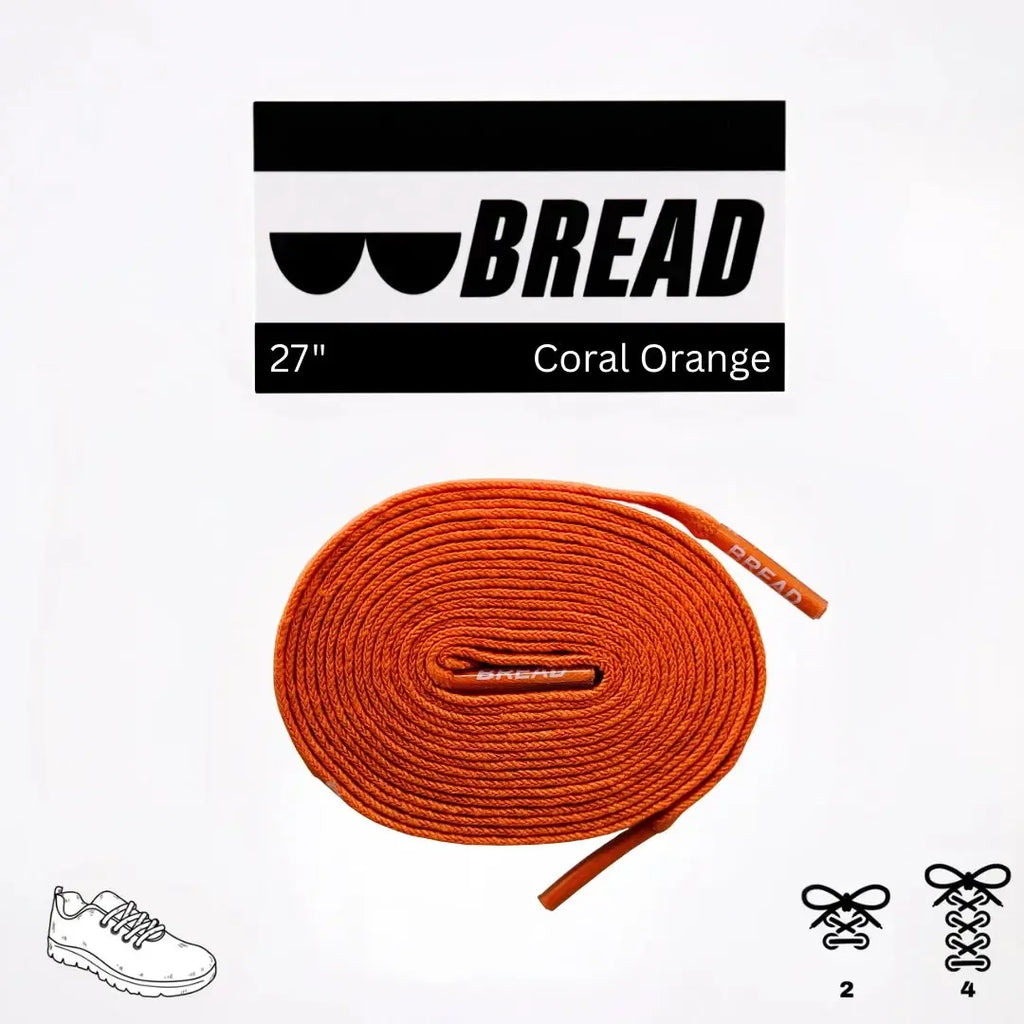 Coral orange elastic shoelace by Bread, displayed flat with flexible texture and vibrant color suitable for casual footwear.