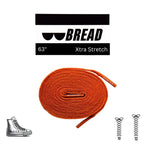 Coral orange elastic shoelace by Bread, showing flexible, vibrant shoelace material with metal aglets for easy lacing.