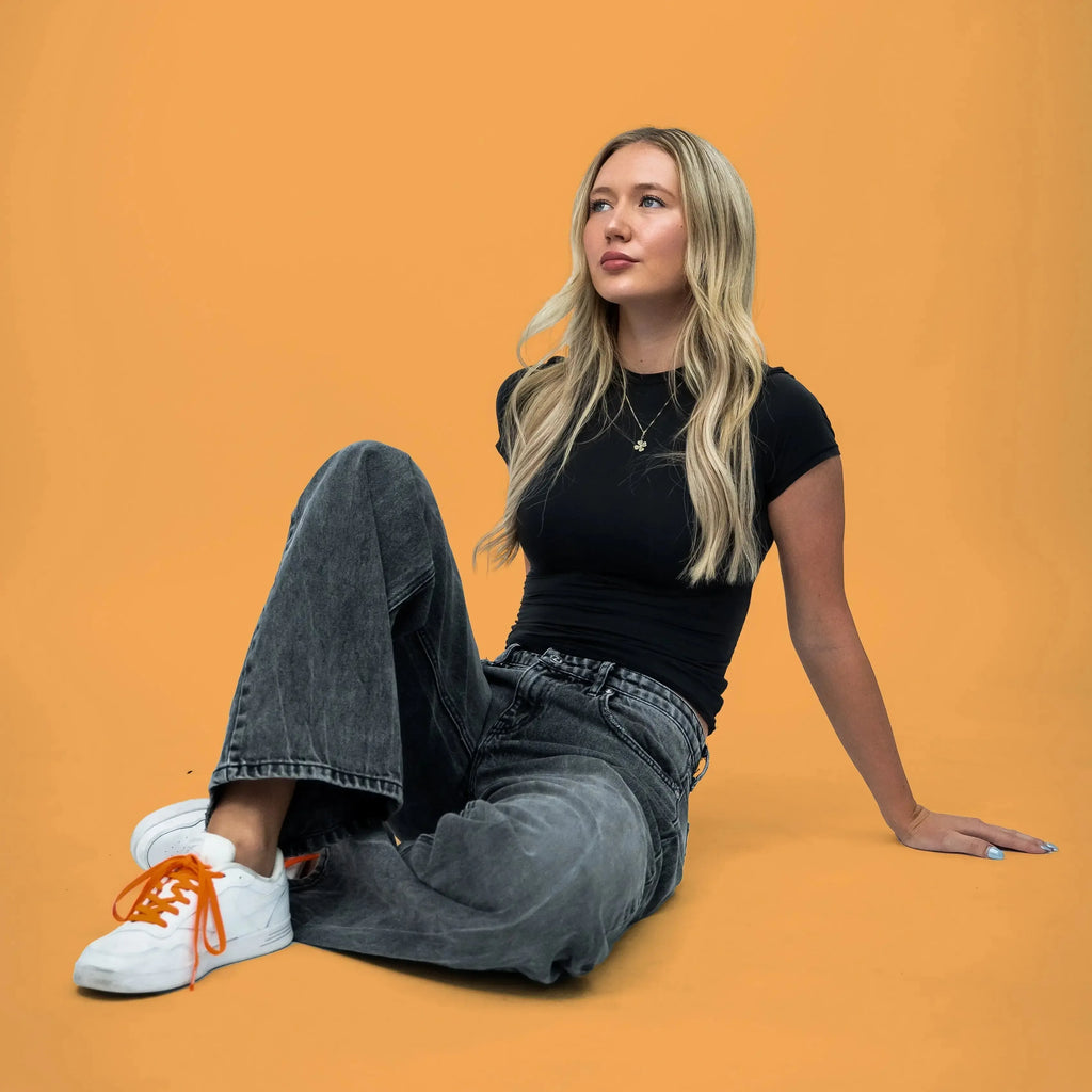 Coral orange elastic shoelace by Bread, stretchy and durable, suitable for casual footwear and sneaker laces.