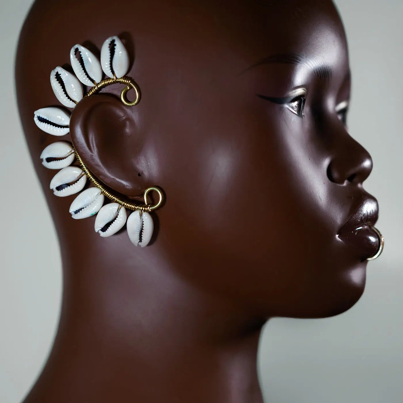 Cowrie Star Ear Cuff Adorned In Taji