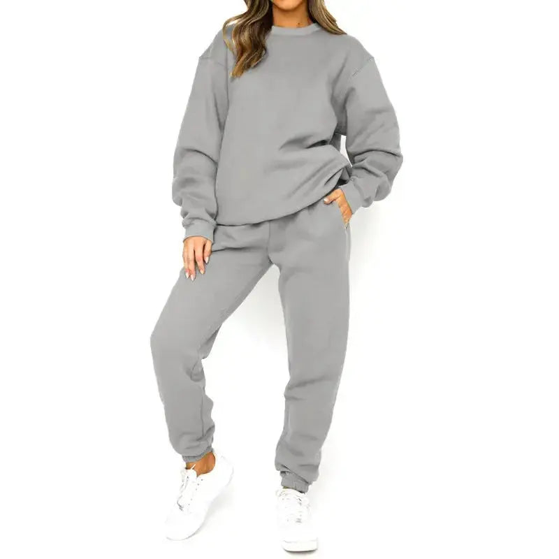 Women’s fleece-lined crew neck sweatshirt and sweatpants loungewear set by Plush Fashion Hub, casual and cozy two-piece fleece set.
