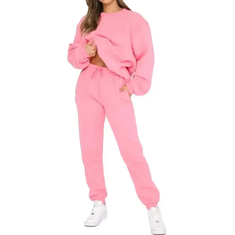 Women’s fleece-lined crew neck sweatshirt and sweatpants loungewear set by Plush Fashion Hub, casual and cozy two-piece outfit.