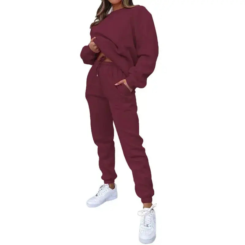 Women’s fleece-lined crew neck sweatshirt and matching sweatpants set from Plush Fashion Hub, casual loungewear for comfort.