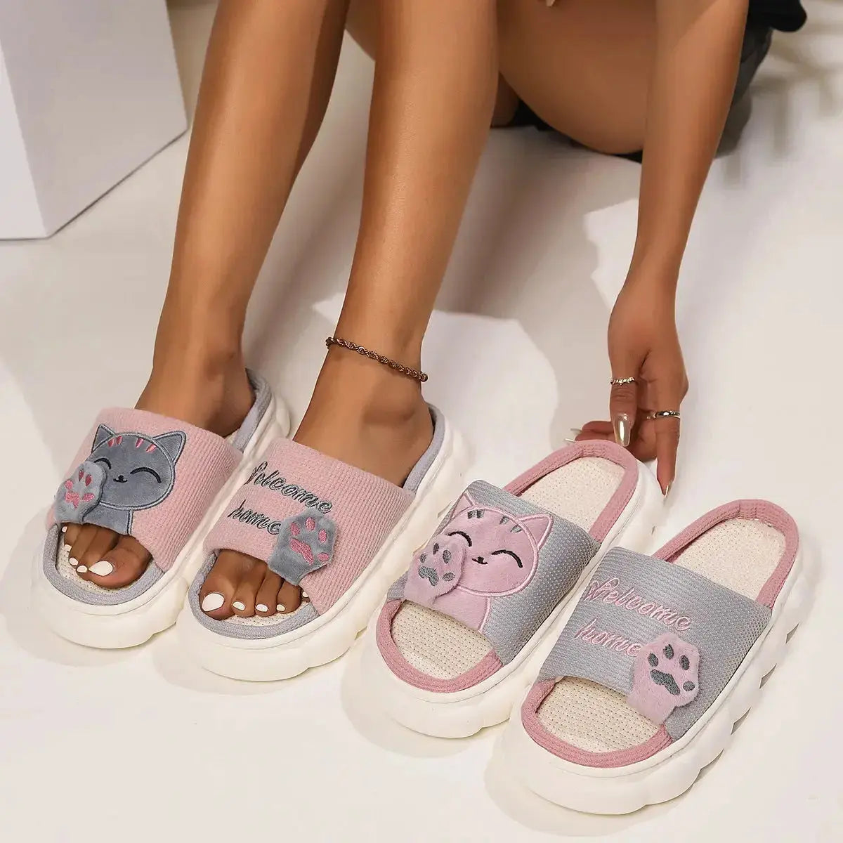 Cute cartoon kitten plush slippers for women by Plush Fashion Hub, soft indoor footwear with adorable feline design.