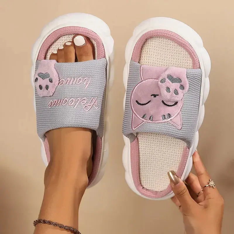 Soft plush cartoon kitten slippers for women, cozy indoor footwear with cute cat face design from Plush Fashion Hub.