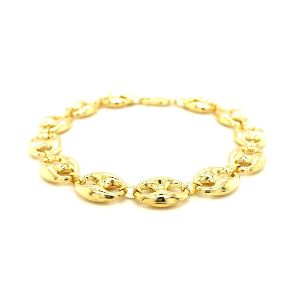 14k yellow gold puffed mariner link bracelet with 11.0mm links, showcasing a luxurious and elegant jewelry design.