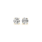 Pair of 1.5 cttw IGI certified lab-grown round diamond stud earrings in 14k yellow gold with G/VS2 clarity.