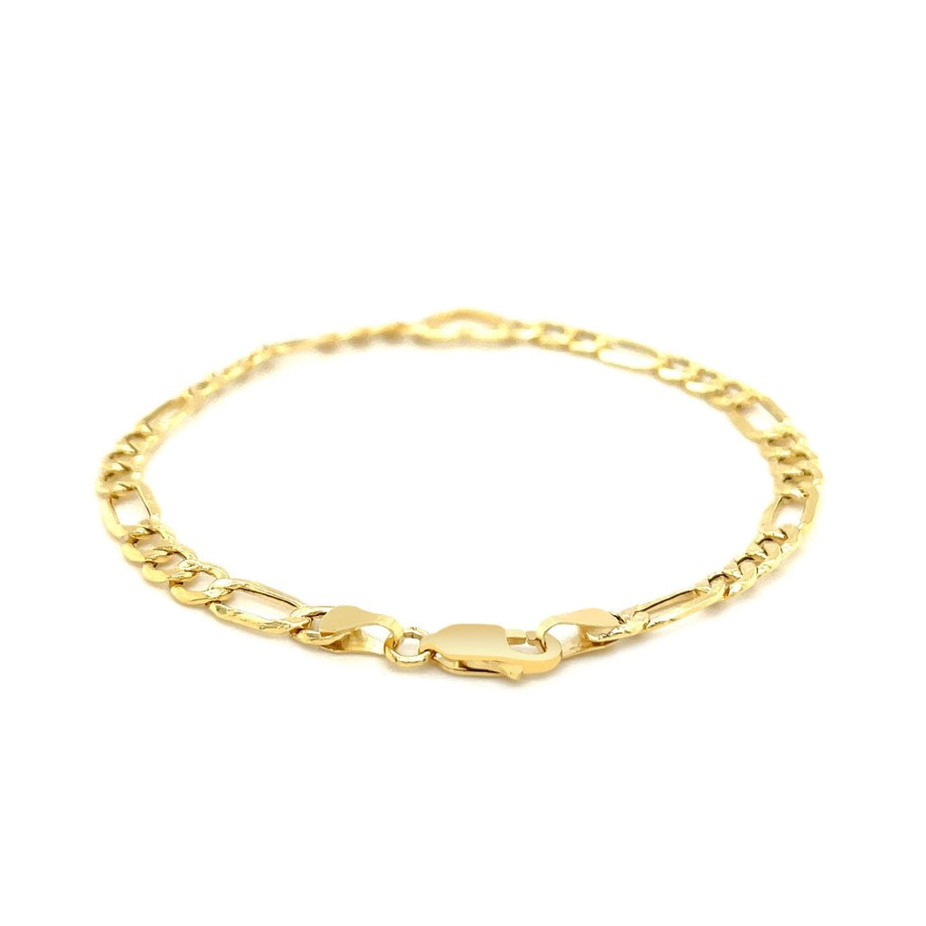14k yellow gold Figaro chain bracelet with a heart charm, 7-inch length, elegant jewelry accessory.