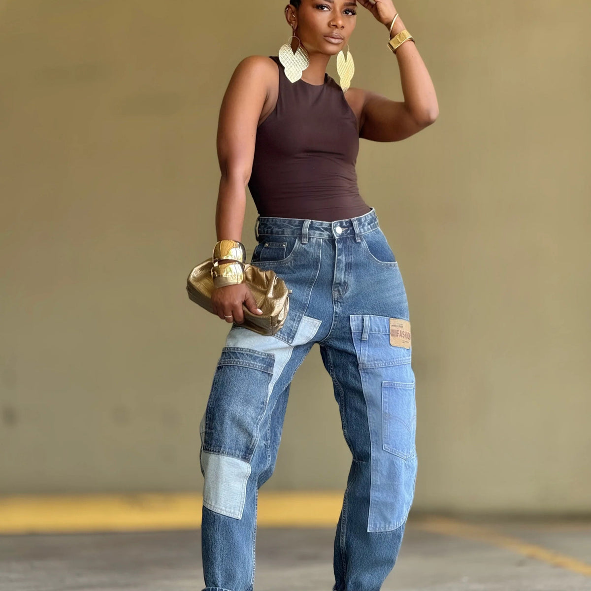 Deconstructed patchwork tapered denim jeans by Plush Fashion Hub featuring multiple pockets and a stylish distressed design.