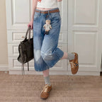Eprolo washed bleached wide-leg straight jeans shown on a model, featuring a relaxed fit and distressed denim style.